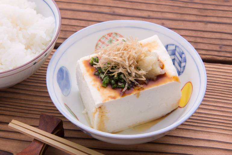 tofu with soy sauce and fish flakes on top